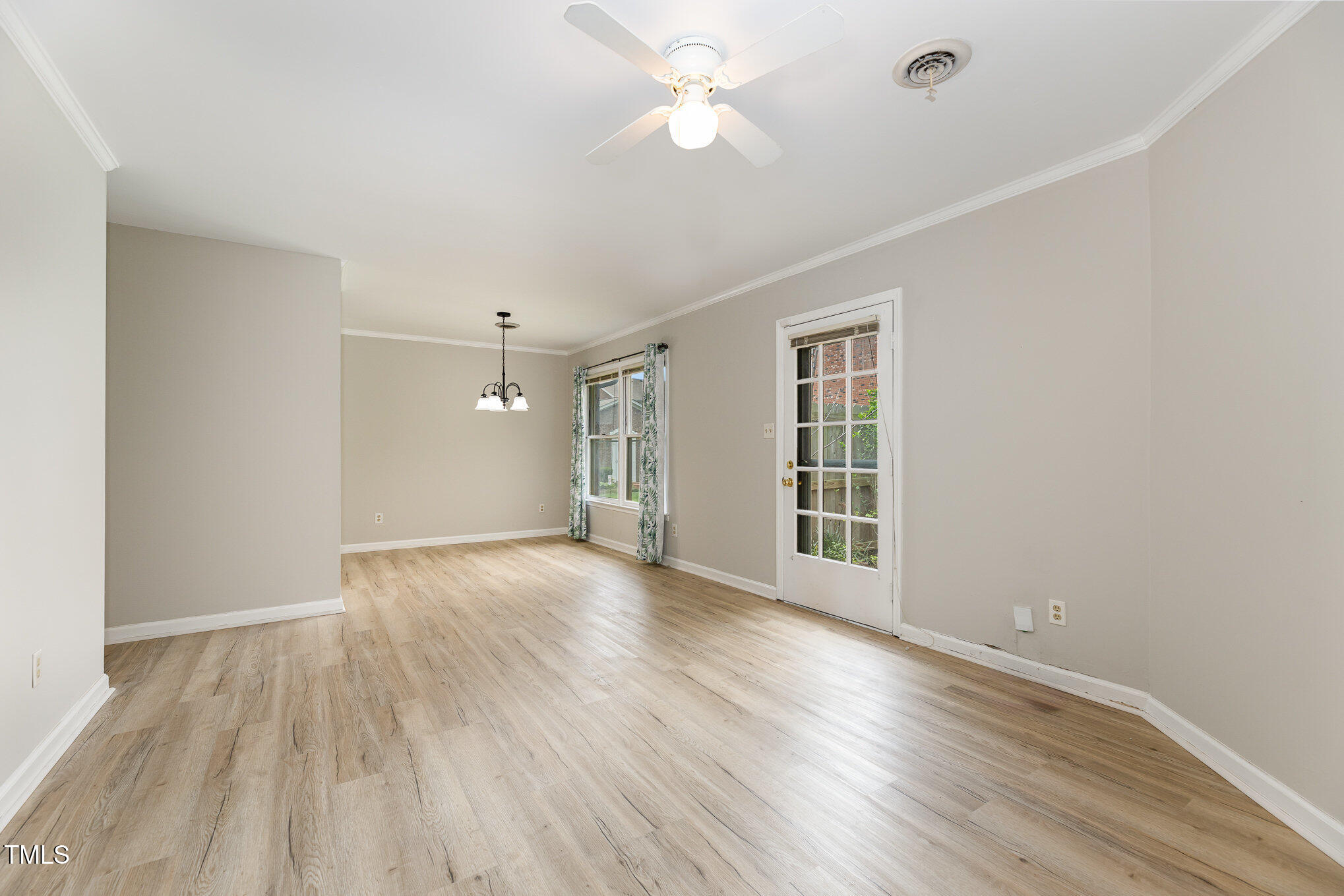 4828 Tower Road, Unit D Greensboro, NC 27410 - Photo 13 of 29 Dining Area Opens Into Living Area
