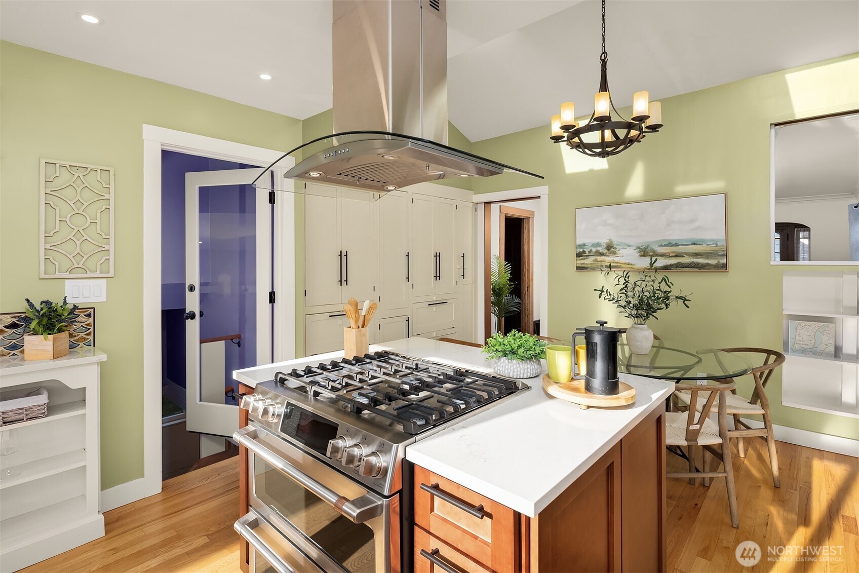349 North 72nd Street Seattle, WA 98103 - Photo 11 of 26 a kitchen with a stove and a table