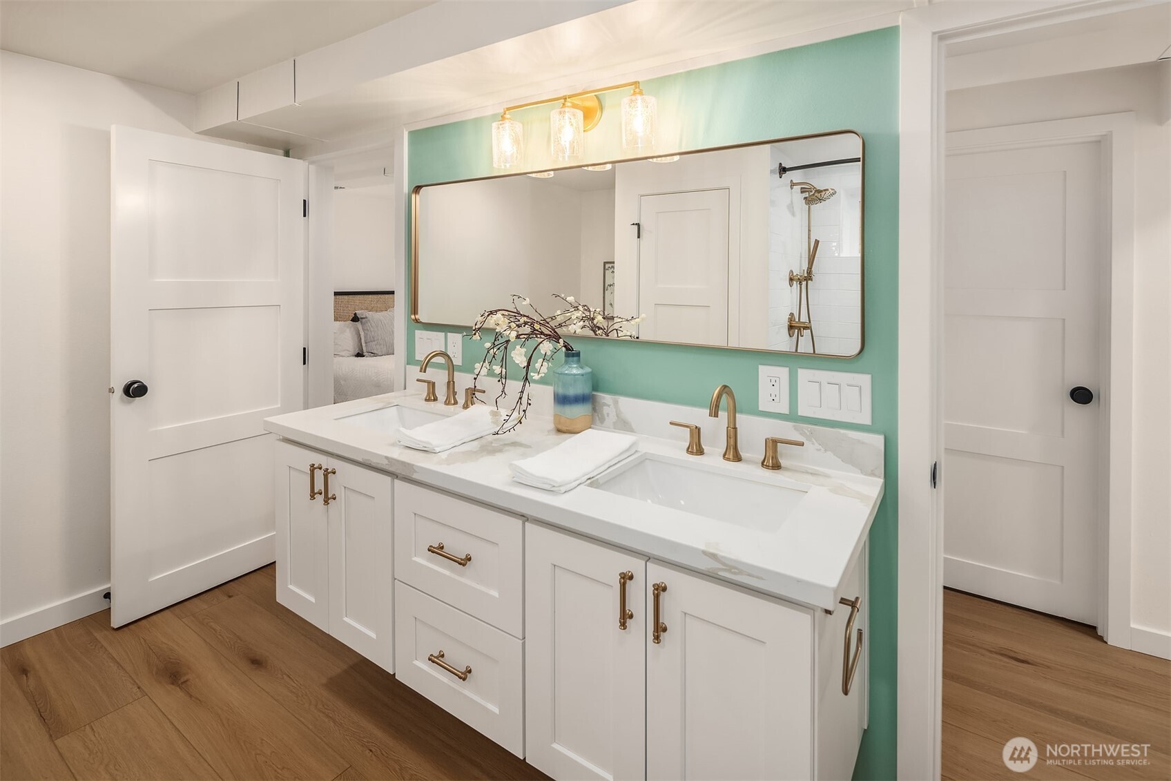 349 North 72nd Street Seattle, WA 98103 - Photo 17 of 26 a bathroom with a sink and a mirror