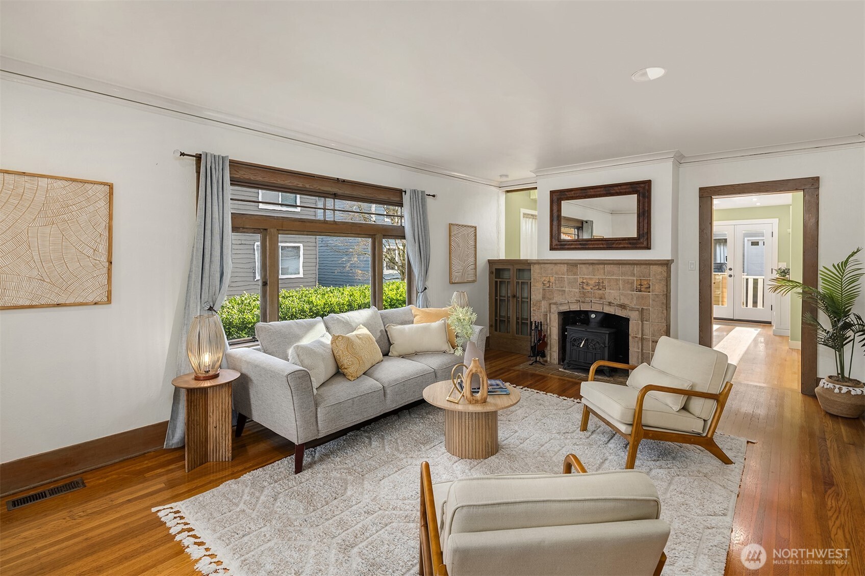 349 North 72nd Street Seattle, WA 98103 - Photo 2 of 26 a living room with furniture and a fireplace