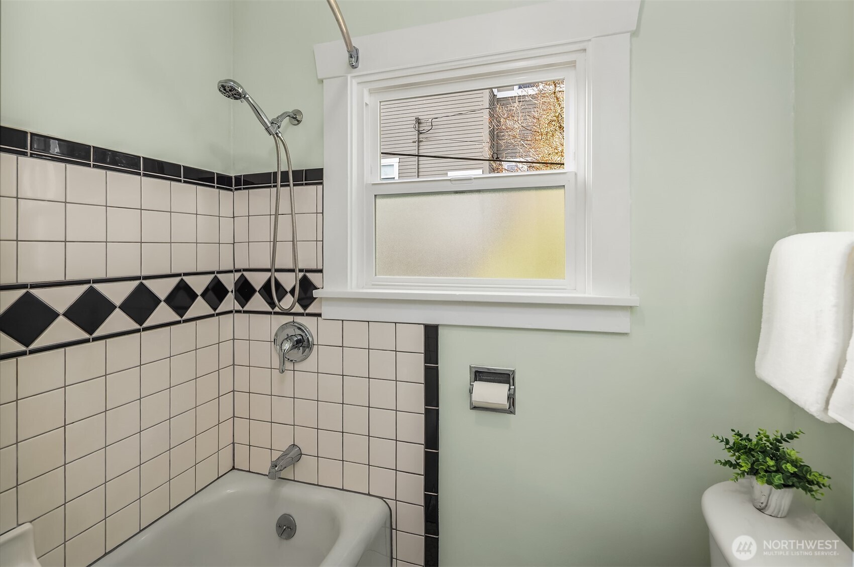349 North 72nd Street Seattle, WA 98103 - Photo 22 of 26 a bathroom with a shower
