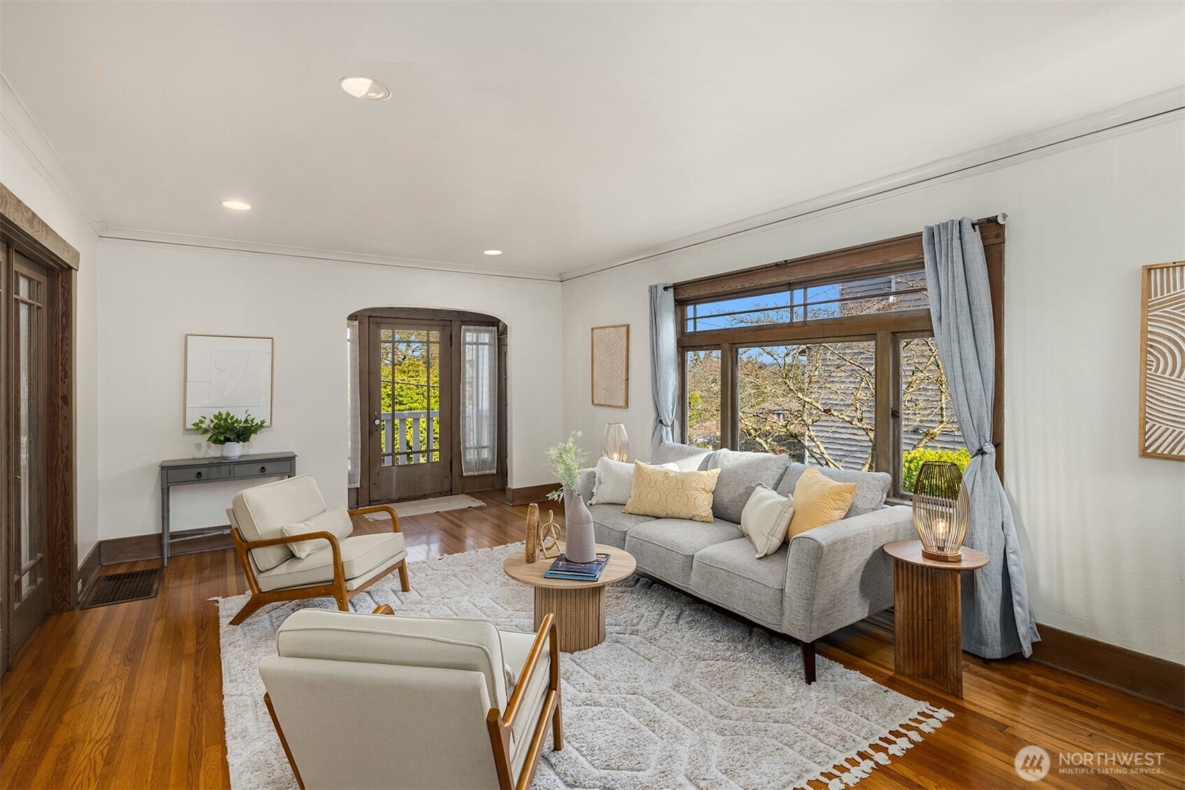 349 North 72nd Street Seattle, WA 98103 - Photo 5 of 26 a living room with furniture and a large window