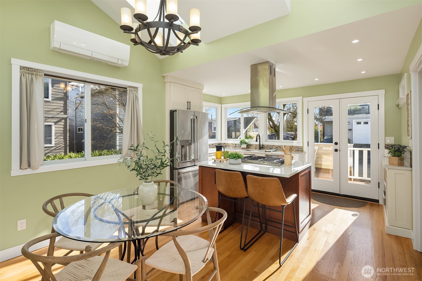 349 North 72nd Street Seattle, WA 98103 - Photo 6 of 26 a view of a dining room with furniture window and wooden floor
