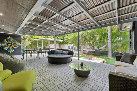 a outdoor living space with furniture and garden view