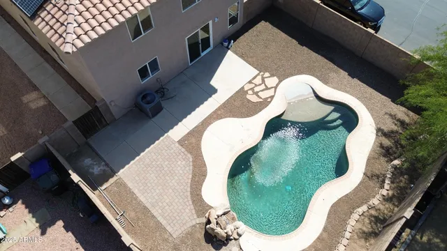 a view of an empty room with empty shelves