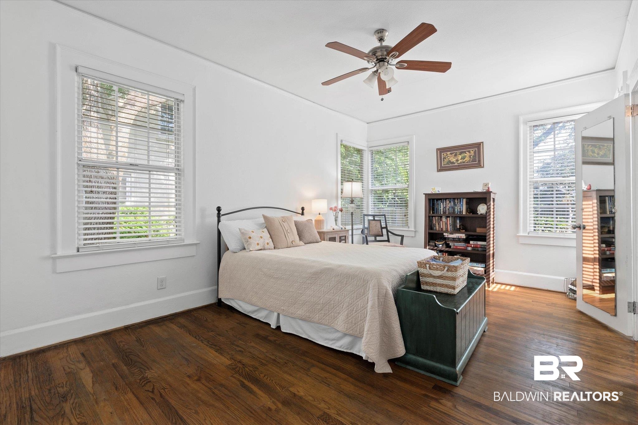 1910 Hunter Avenue Mobile, AL 36606 - Photo 13 of 21 Bedroom featuring baseboards, dark wood-style flooring, and ceiling fan
