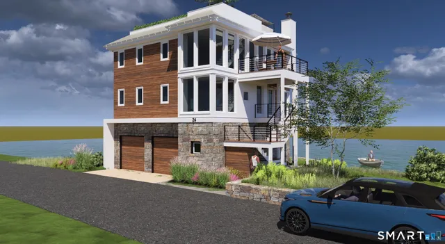 an aerial view of a houses with ocean view