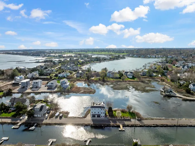 an aerial view of a house with outdoor space
