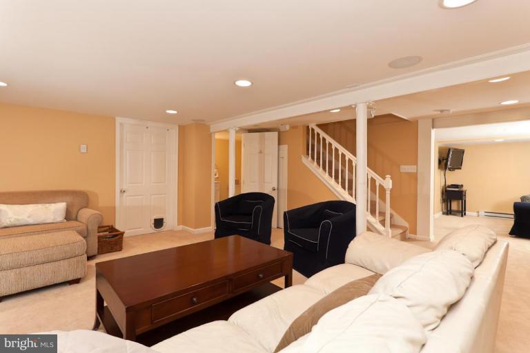 221 Tunbridge Road Baltimore, MD 21212 - Photo 11 of 14 a living room with furniture and a couch