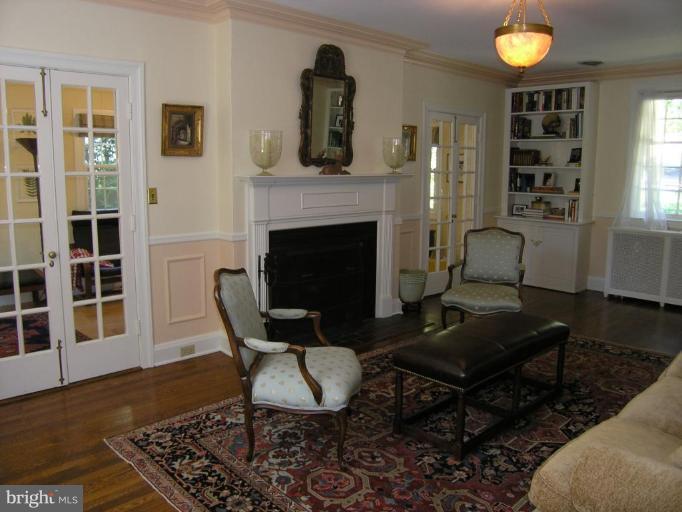 221 Tunbridge Road Baltimore, MD 21212 - Photo 13 of 14 a living room with furniture and a fireplace