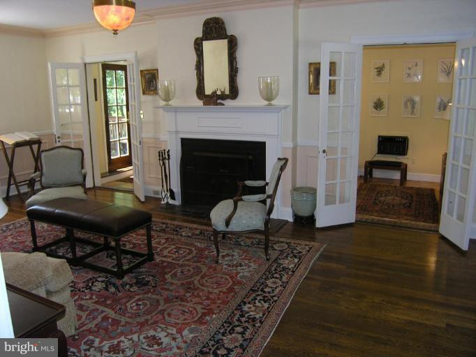 221 Tunbridge Road Baltimore, MD 21212 - Photo 14 of 14 a living room with furniture and a fireplace