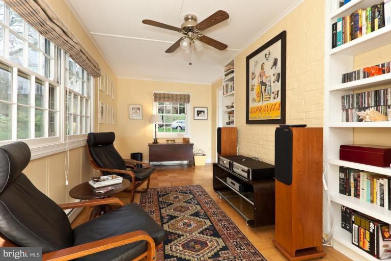 221 Tunbridge Road Baltimore, MD 21212 - Photo 8 of 14 a living room with furniture and a flat screen tv