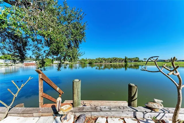 a view of a room with lots of space and wooden floor