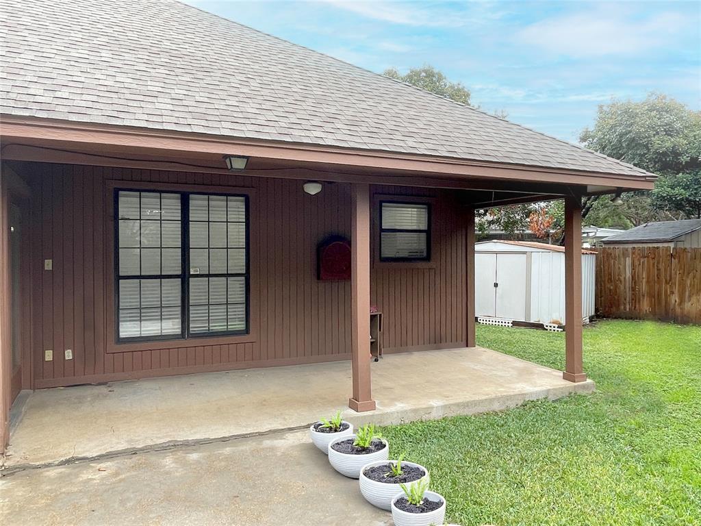 7716 Harmony Drive Fort Worth, TX 76133 - Photo 36 of 40 a front view of a house with garden