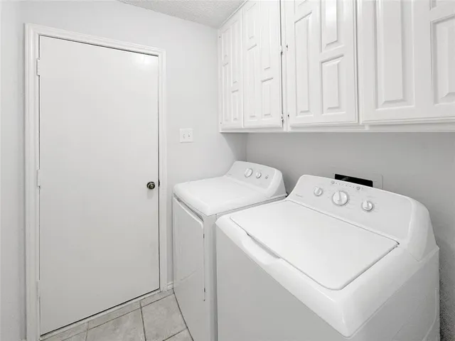 a view of yard with patio