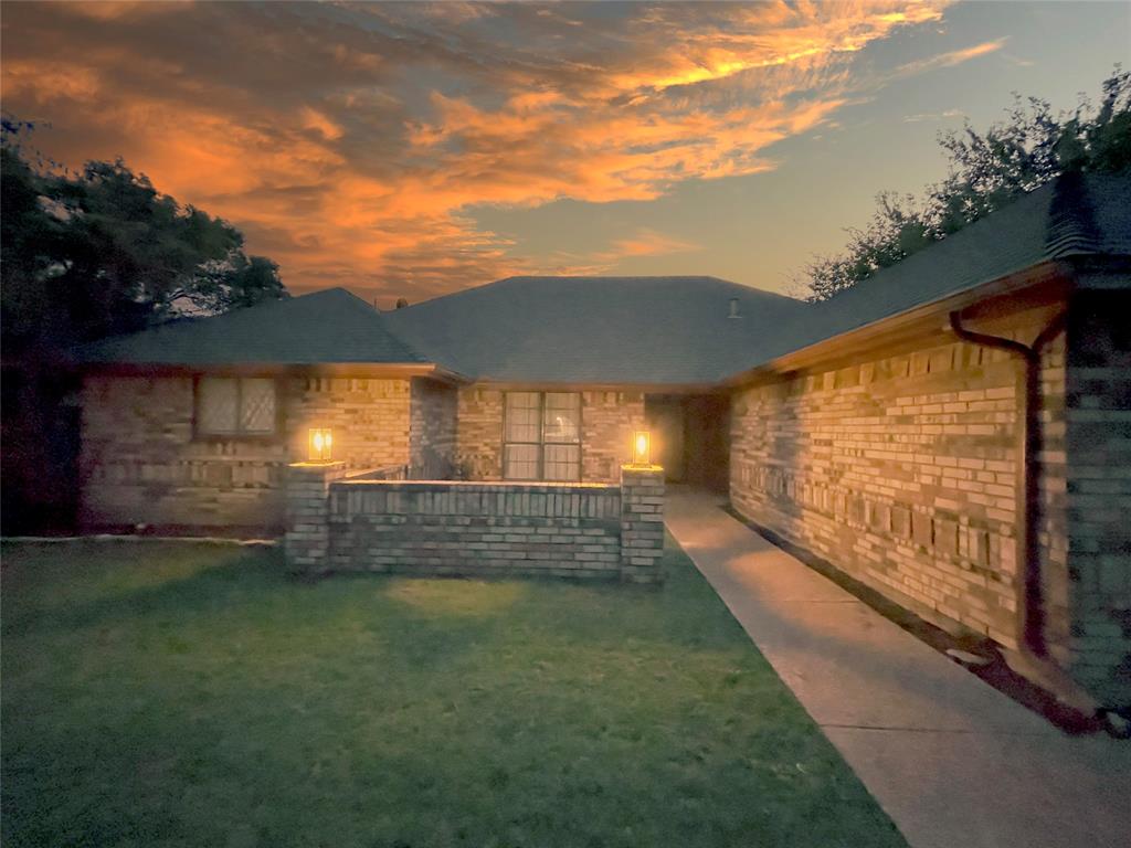 7716 Harmony Drive Fort Worth, TX 76133 - Photo 40 of 40 a view of yard with patio