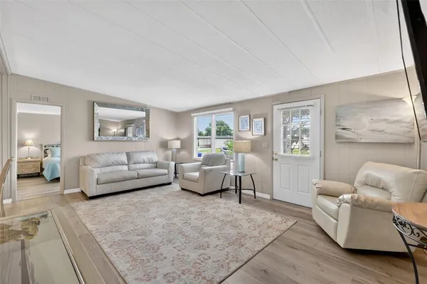 a living room with furniture and a couch