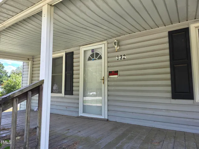 a view of front door and porch