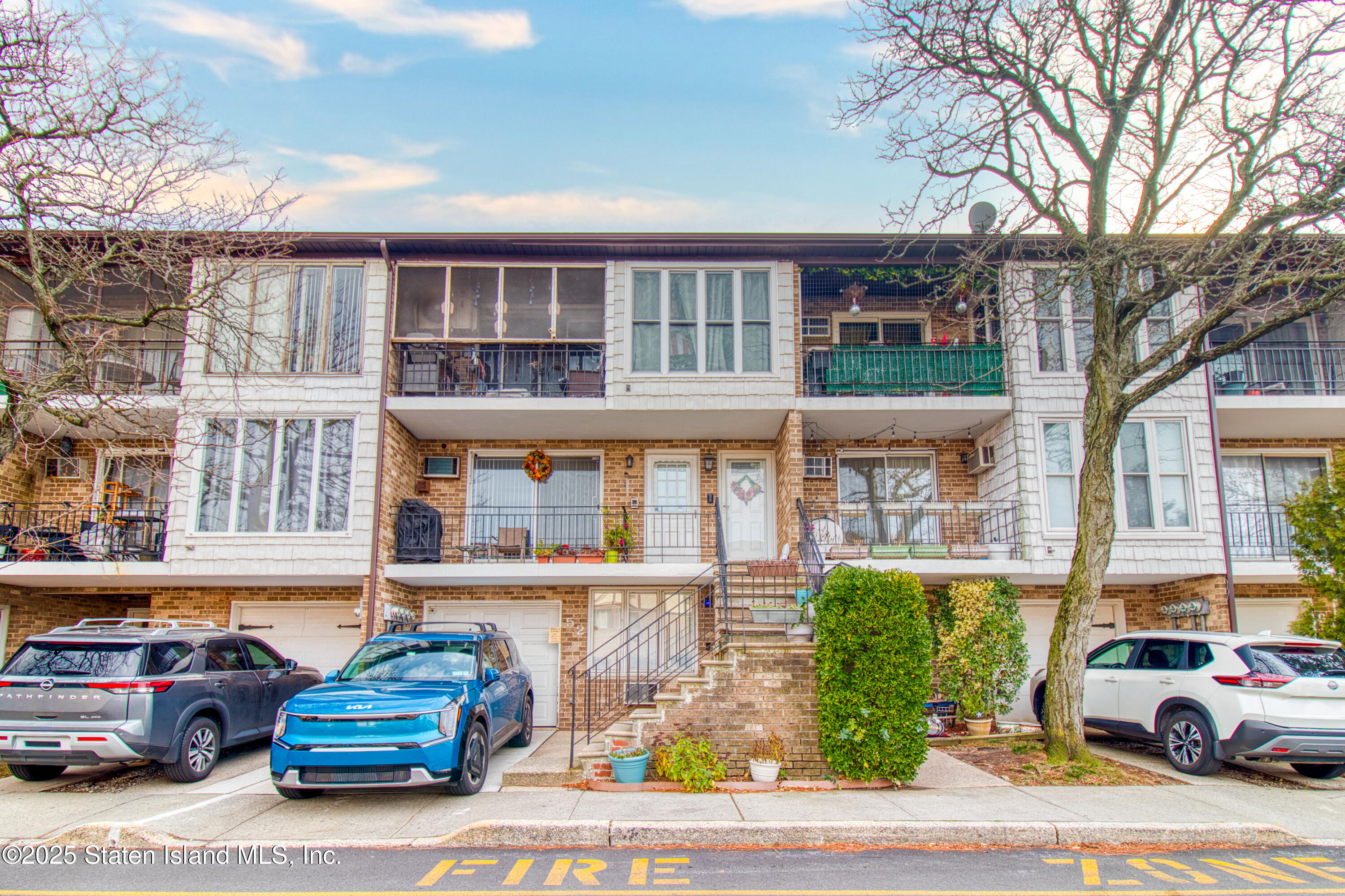 a cars parked in front of a building