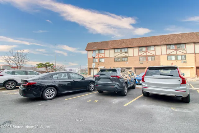 a car parked in front of a house