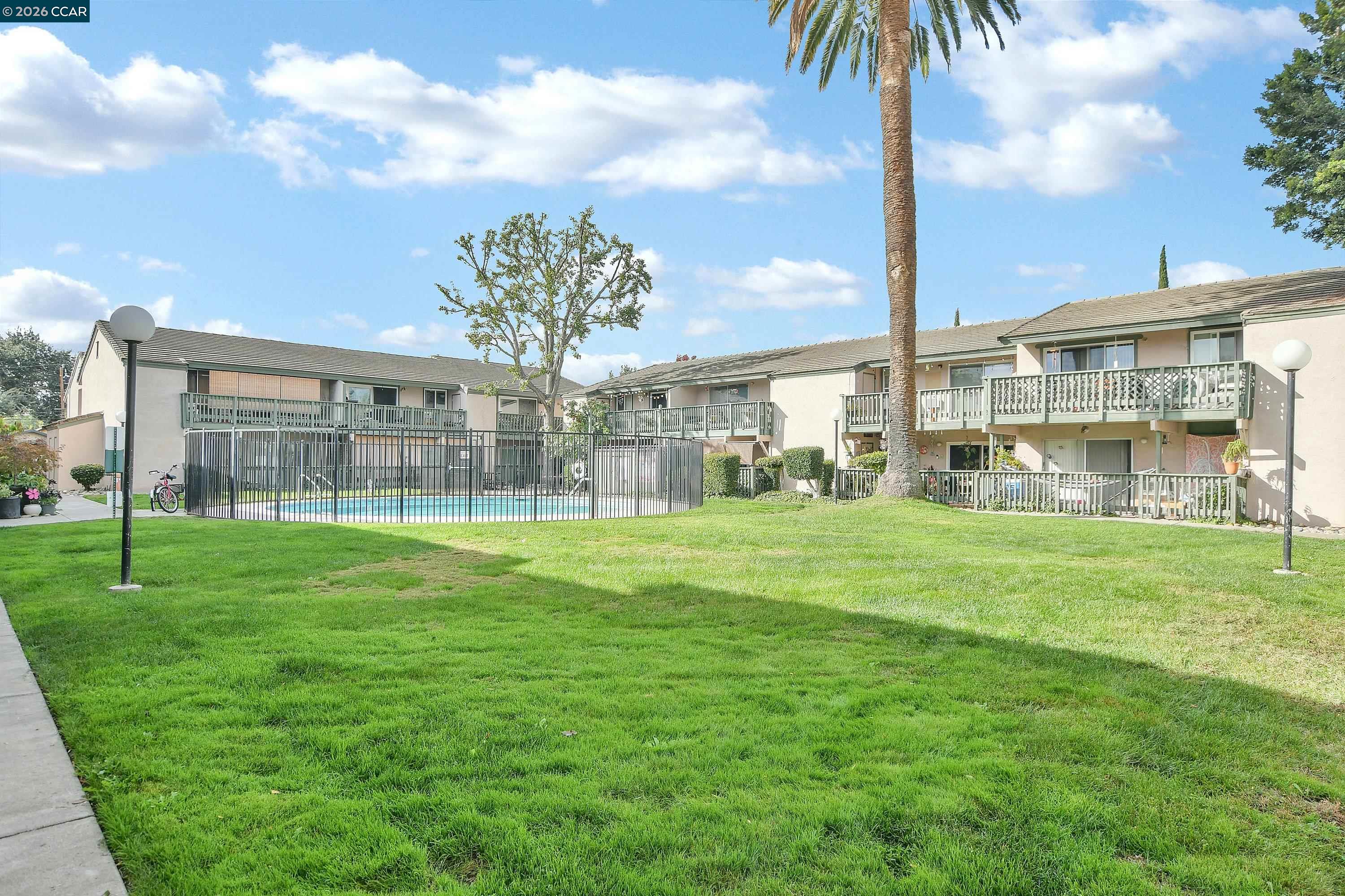 4888 Clayton Road, Unit 6 Concord, CA 94521 - Photo 2 of 16 a view of a garden with a apartment