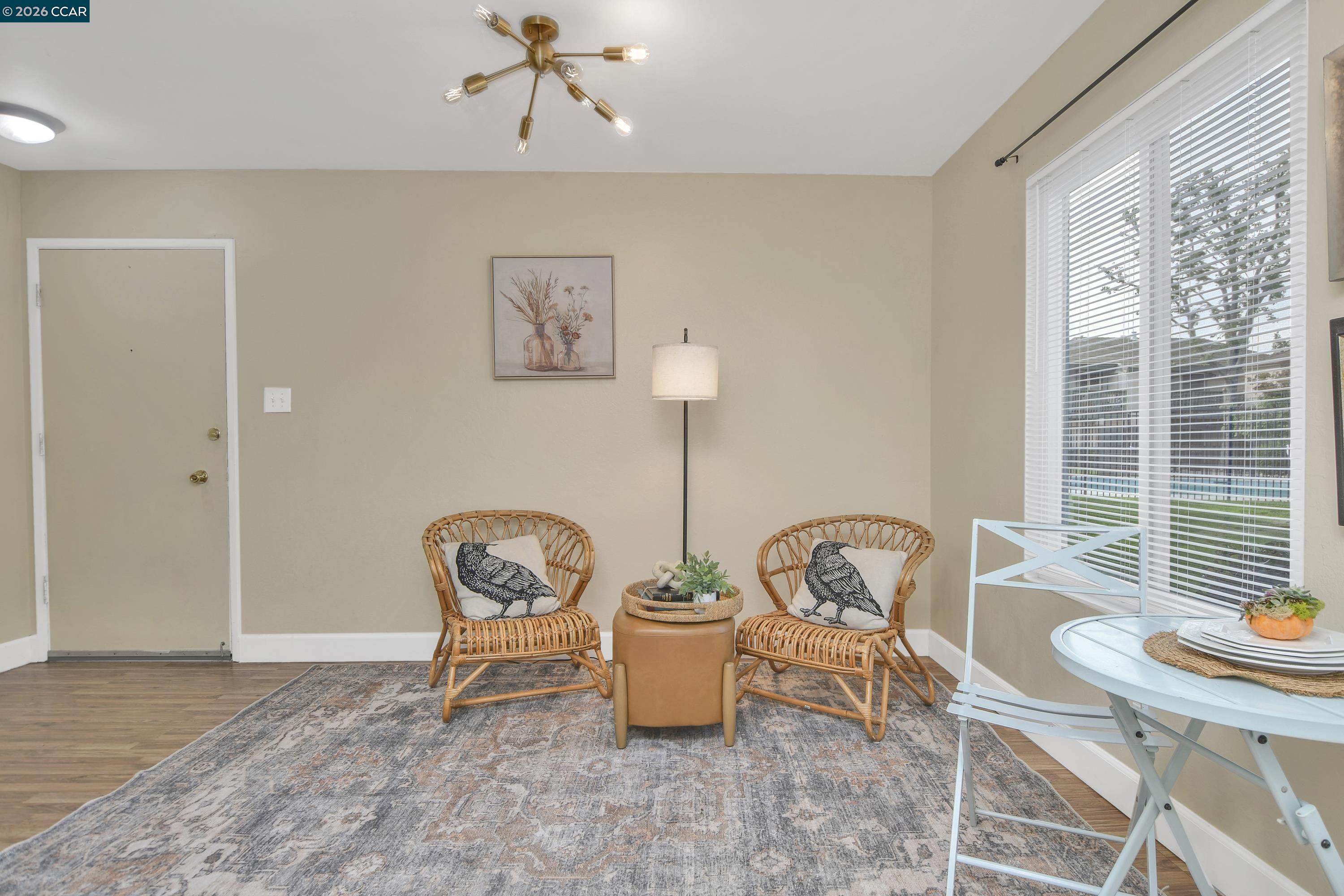 4888 Clayton Road, Unit 6 Concord, CA 94521 - Photo 6 of 16 a room with a table and chairs