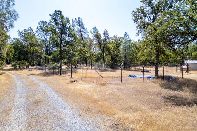 a view of snow on the side of a road