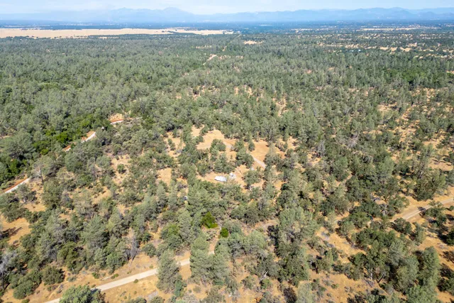 a view of a city with mountain