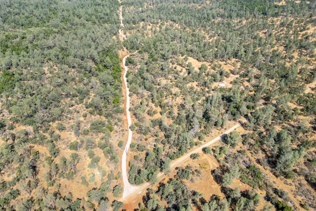 a bird view of a house and a yard