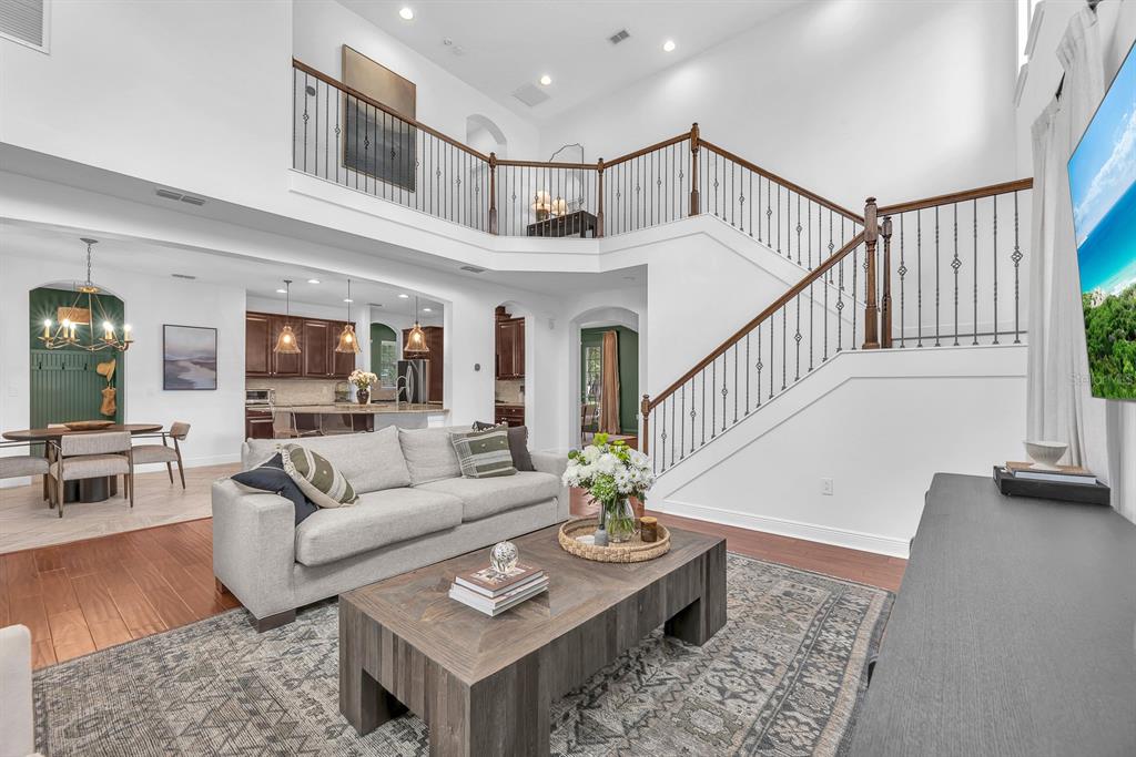 5310 Fishhawk Ridge Drive Lithia, FL 33547 - Photo 10 of 52 a living room with furniture and wooden floor
