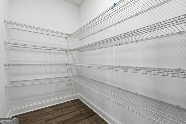 a view of a room with racks on the wall