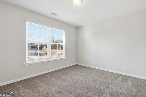 an empty room with a window
