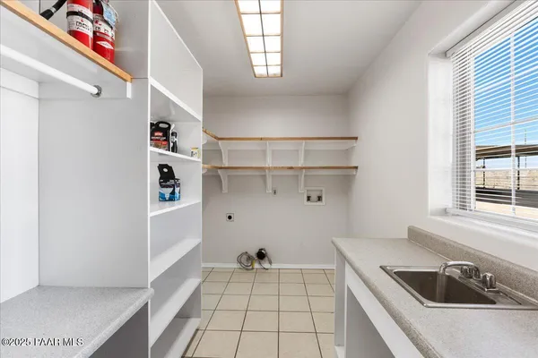 a view of yard with swimming pool and green space