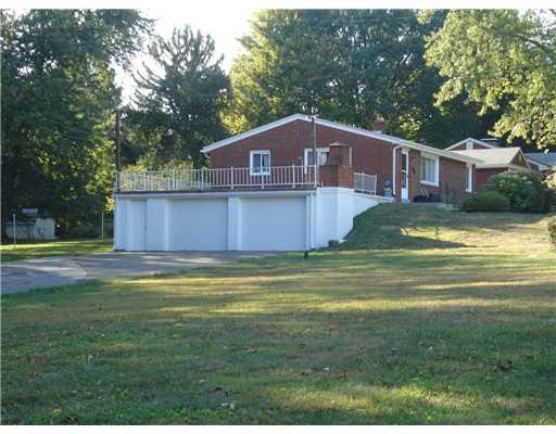2265 Rochester Road Franklin Park, PA 15237 - Photo 2 of 17 Exterior Front. Front and Side View Large 2 Car Garage New Insulated Doors 23x16 23x16