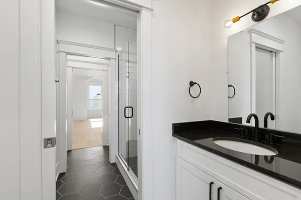 a view of a balcony with wooden floor