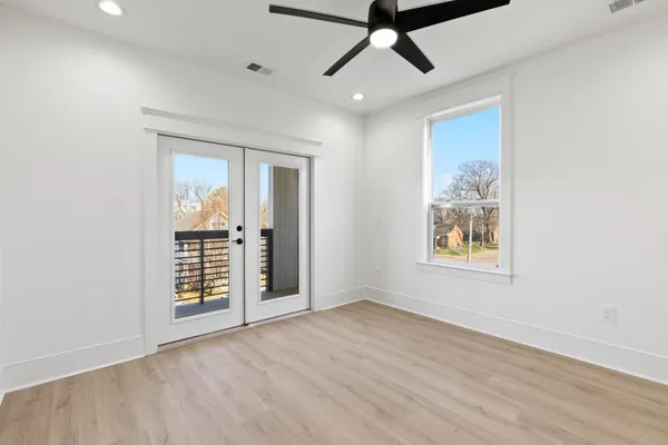 a bathroom with a sink a toilet a shower and a mirror