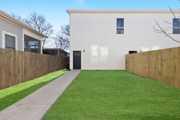 a kitchen with stainless steel appliances a refrigerator stove and microwave