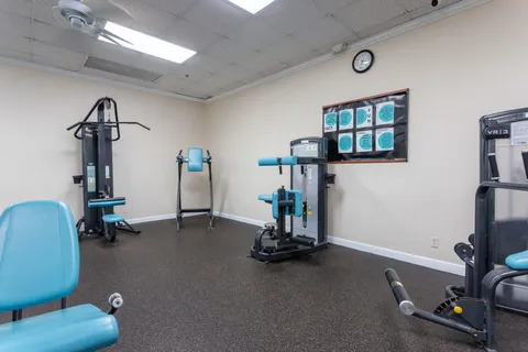 a view of a room with gym equipment