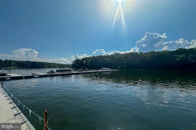 a view of a lake with a mountain in the background