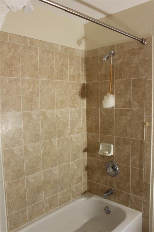 74 Belem Street Punta Gorda, FL 33983 - Photo 13 of 34 a bathroom with a shower and a sink