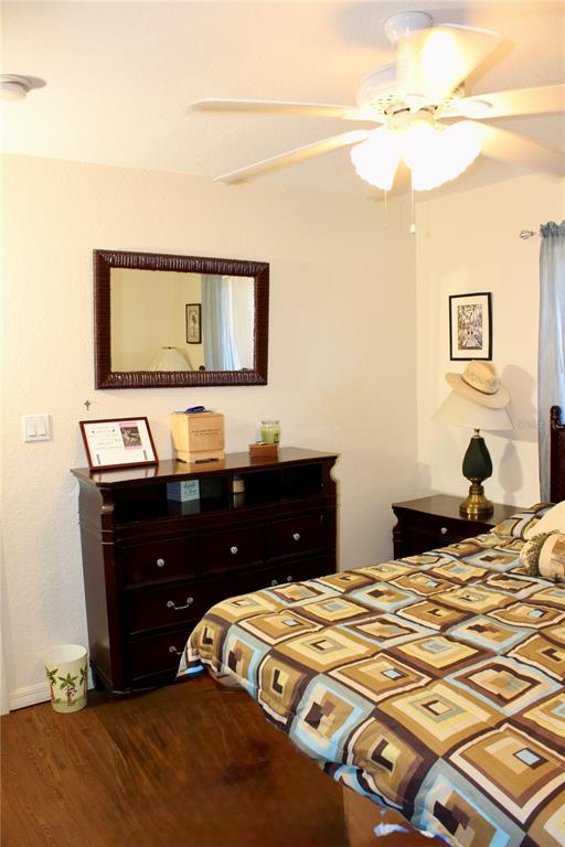 74 Belem Street Punta Gorda, FL 33983 - Photo 18 of 34 a bedroom with a bed and a dresser