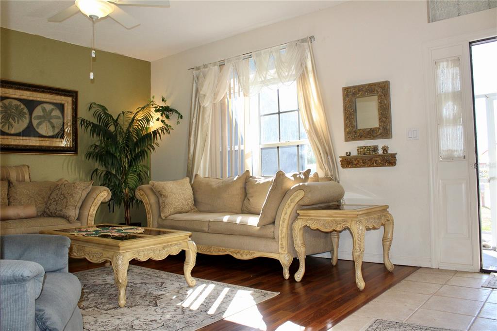 74 Belem Street Punta Gorda, FL 33983 - Photo 21 of 34 a living room with furniture and wooden floor