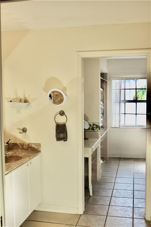74 Belem Street Punta Gorda, FL 33983 - Photo 28 of 34 a kitchen with stainless steel appliances granite countertop a refrigerator and a stove
