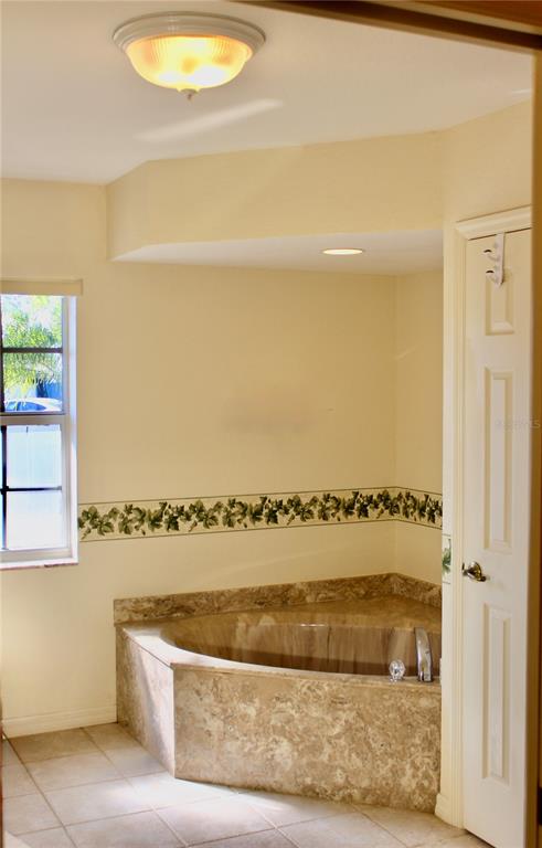 74 Belem Street Punta Gorda, FL 33983 - Photo 29 of 34 a view of a bathtub in a room