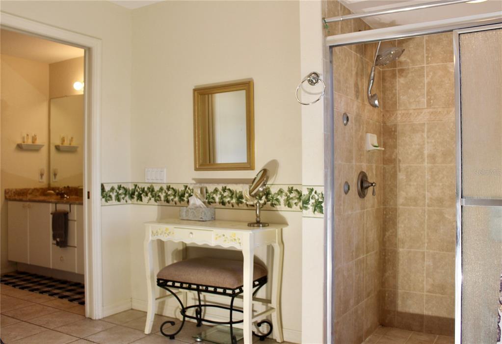 74 Belem Street Punta Gorda, FL 33983 - Photo 31 of 34 a bathroom with a sink and a mirror