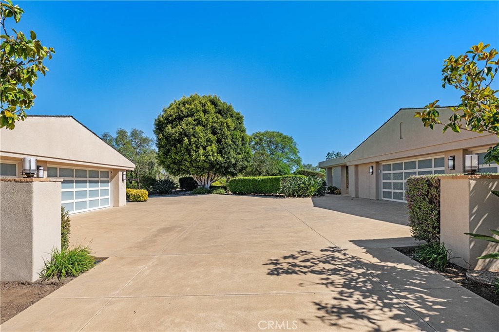 6533 Lago Lindo Rancho Santa Fe, CA 92067 - Photo 55 of 57 a house with a yard and a outdoor space