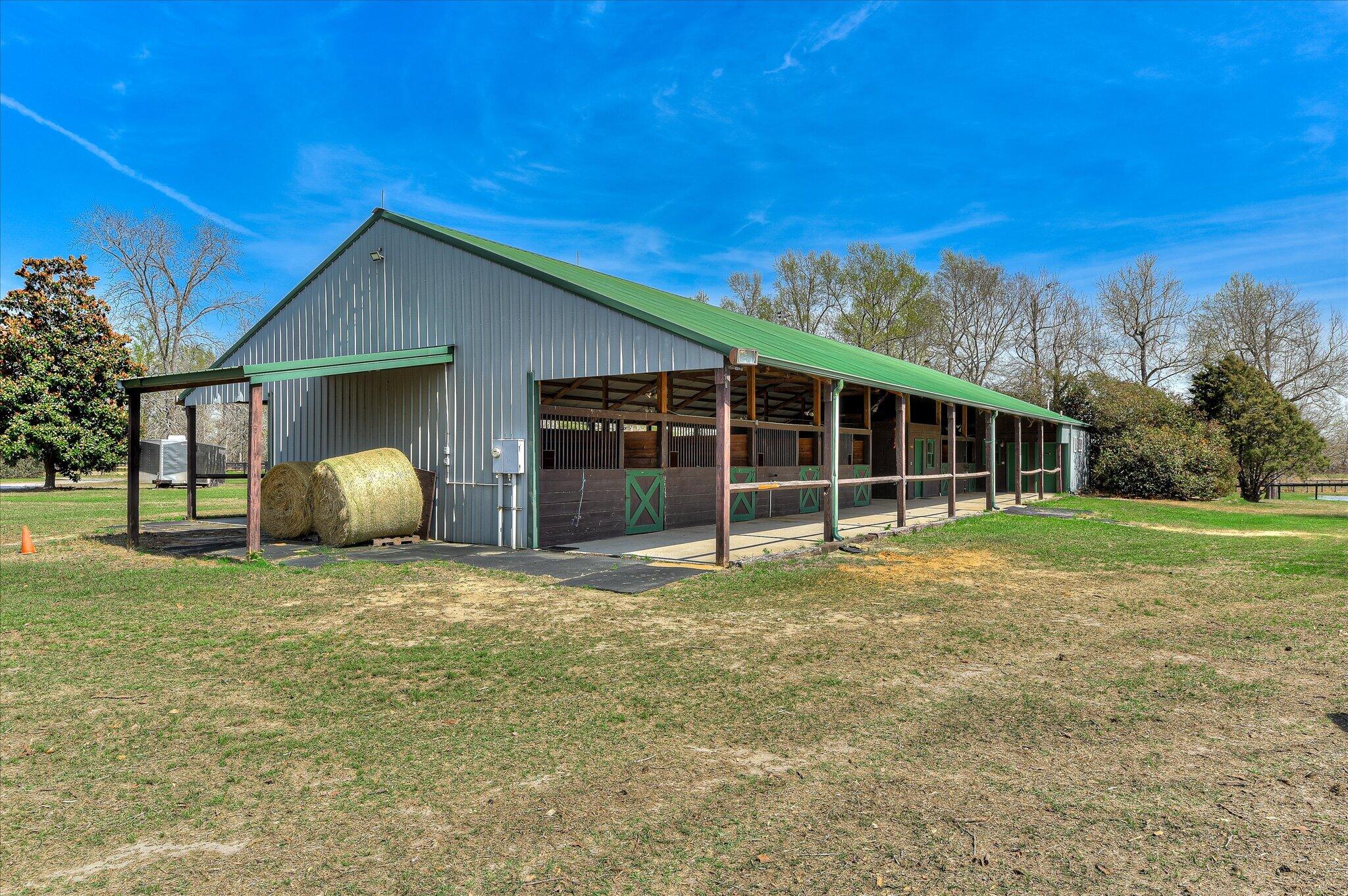 1063 Colbert Bridge Road Aiken, SC 29803 - Photo 2 of 68 a view of a house with backyard and porch
