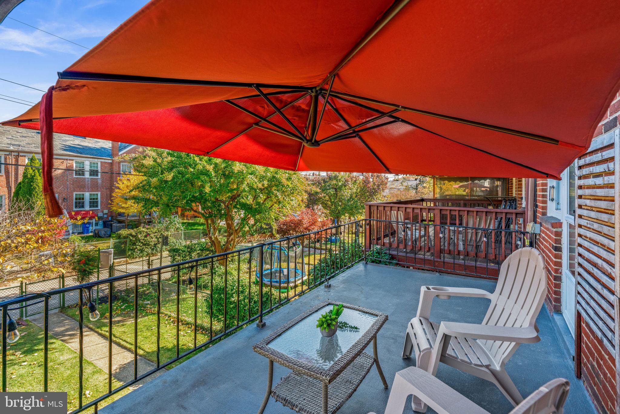 321 Stratford Road Baltimore, MD 21228 - Photo 27 of 34 a view of a chair and tables in the balcony