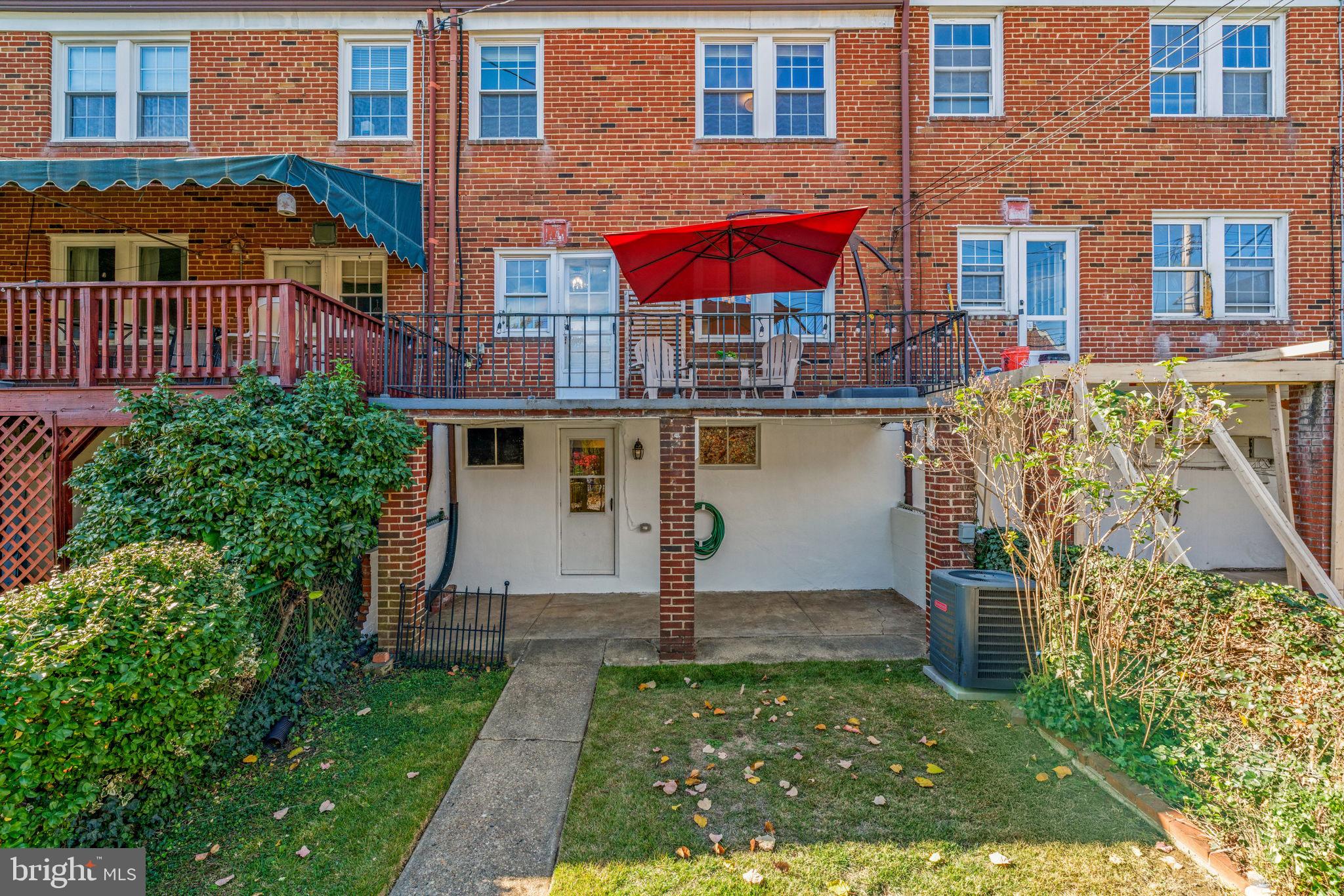 321 Stratford Road Baltimore, MD 21228 - Photo 28 of 34 a front view of a house with a yard