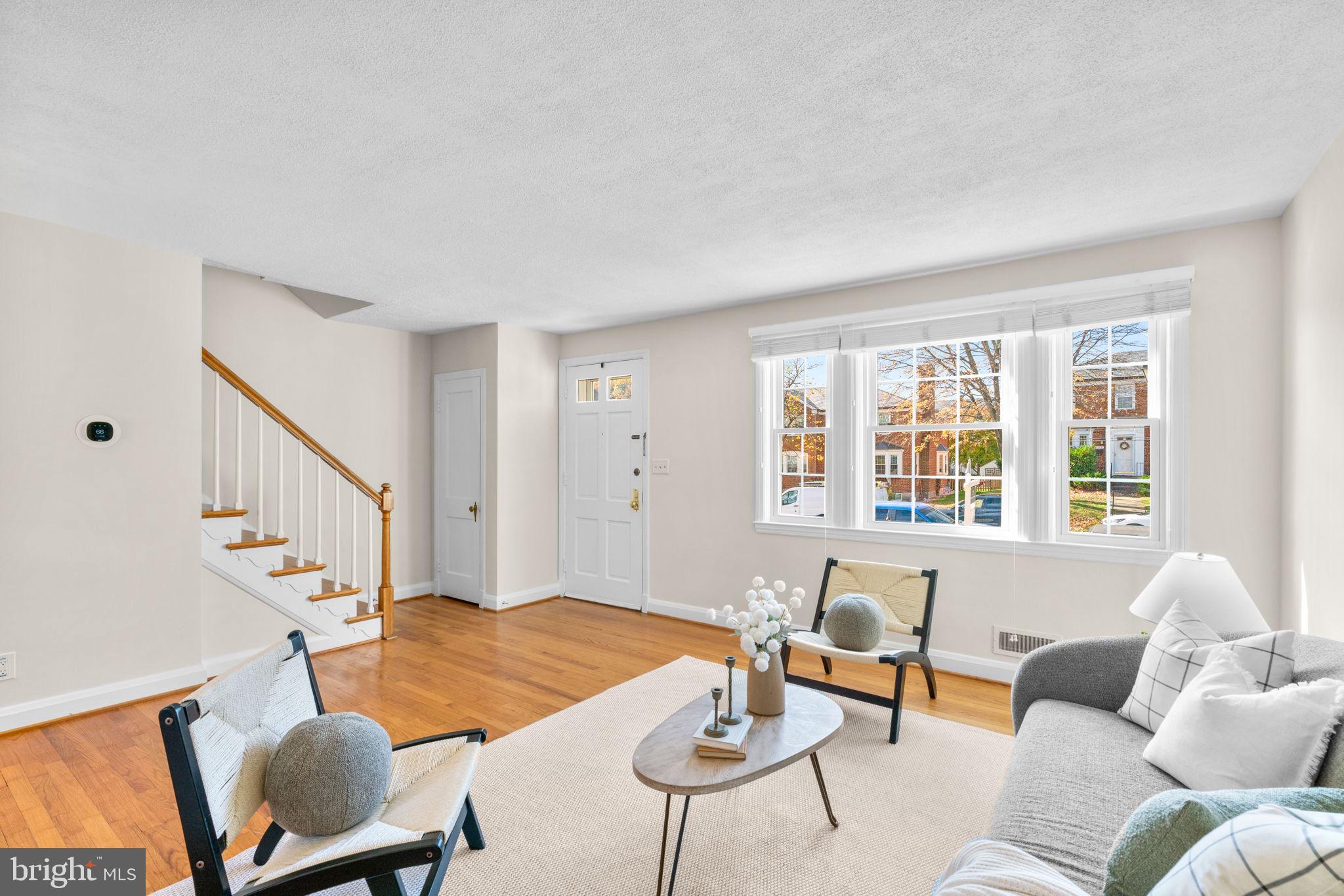 321 Stratford Road Baltimore, MD 21228 - Photo 5 of 34 a living room with furniture and a window